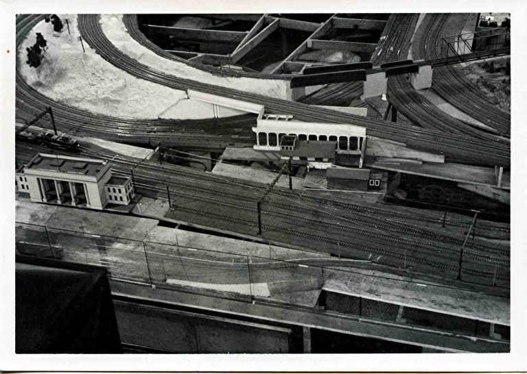 Black and white photo of a historic model railroad yard layout
