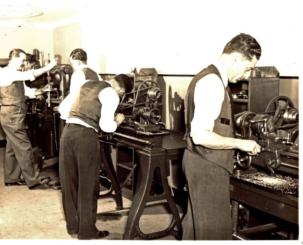 Men operating lathes, historic photo