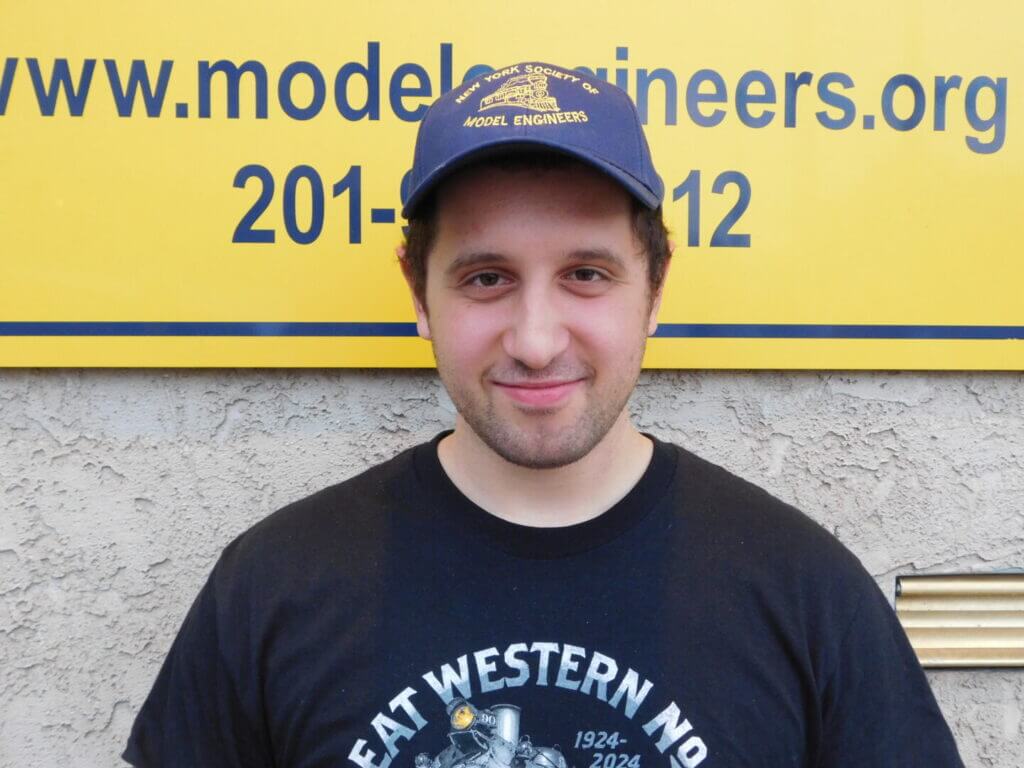 Young club member in a cap